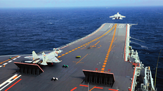 何雷：深入貫徹依法治軍戰(zhàn)略奮力建設(shè)世界一流軍隊